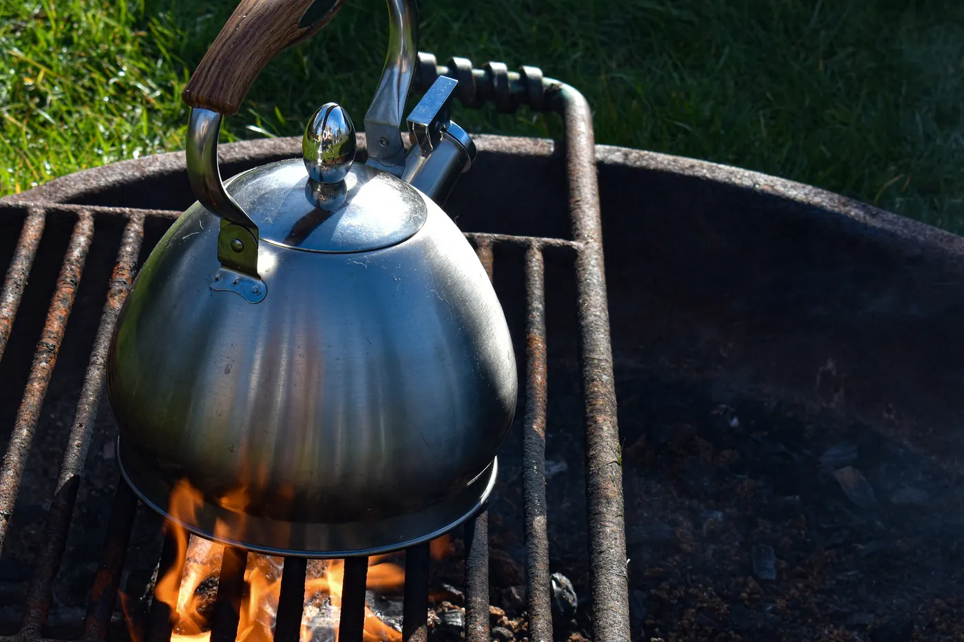 A camp kettle over an open fire